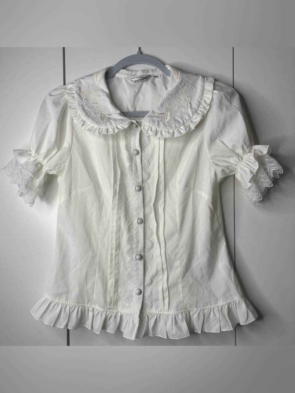 Ivory Ruffled Peter Pan Collar Blouse with Lace Trim